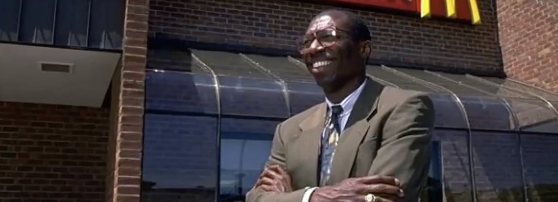 a young Herb Wasington in front of a McDonald's store